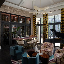 Dramatic Living Room with Ceiling Detail, Bar and Eclectic Seating