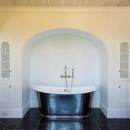 Silver Plated Slipper Tub in Tiled Arched Recess with Black Stone Floor