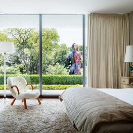 Iconic modern House on the Gold Coast of Long Island - master bedroom self lined brisby pleat with resessed tracks 