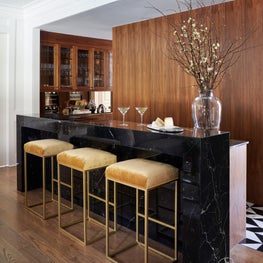 Inspired by the homeowners’ time living in France and Damascus, our team transformed this bar into a sophisticated space filled with vintage touches