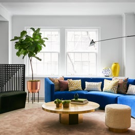 Strong forms and color against crisp white architecture. Park Ave living room.