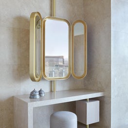 Cosmopolitan of Las Vegas - ivory onyx vanity table, gold leaf mirror
