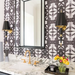 Portfolio: Gorgeous bathroom featuring custom wallpaper and gold and crystal hardware