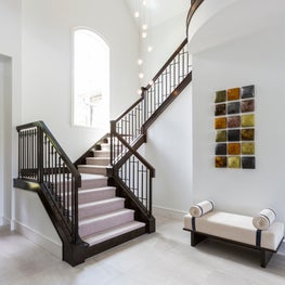 Portfolio: Contemporary-modern Woodlands home, sophisticated foyer with statement lighting