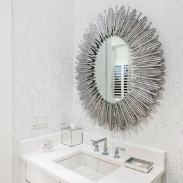 SLEEK CONTEMPORARY METALLIC RESIDENCE, metalic bathroom, silver sunburst mirror, white tile, neutral bathroom