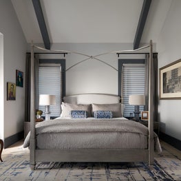 Contemporary accents with transitional elements create the perfect bedroom
