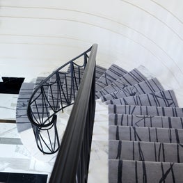 Custom Rug, Plaster Walls, Custom Railing