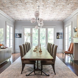Modern Traditional Dining Room with Reflective Glossy Walls and Ceiling Detail