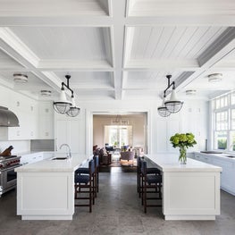 Hamptons Residence, open Kitchen w/ minimal white palette and coffered ceiling