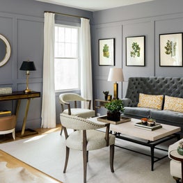 Living room with painted panel walls