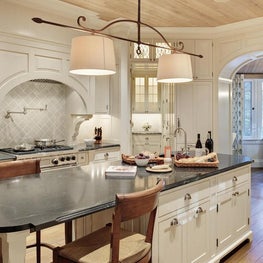 White Painted Kitchen with Natural Ceiling and Large Island with Seating