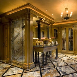 Inspired by the homeowner’s extraordinary collections of art and fine antique furniture, this home also reflects touches of Italy – including the homeowner’s bathroom vanity, modeled after Palladio’s Villa Barbaro.  