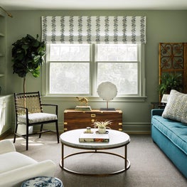 Green painted study with custom builts in