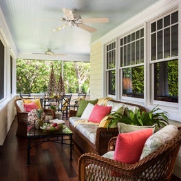 The enclosed porch captures the homes appealing "cottage" elements.