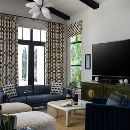 Eclectic Family Room with Ceiling Beams