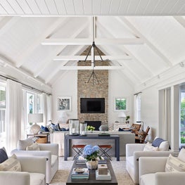 Family Room, Workstead Overhead Lighting, Circa Lighting Side Tables, Ralph Lauren Side Chairs, Lee Jofa White Armchairs, Alicia Adams Alpaca Throw - Coastal-Inspired Chicago Project