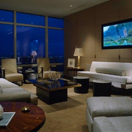 NYC Apartment Living Room with City Views, Built in TV, Neutral Palette 