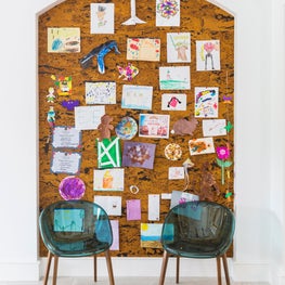 Portfolio: Large cork pin board display for kids' artwork in contemporary style home