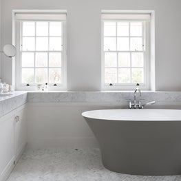 Carrera marble luxury master bathroom with free standing bath 