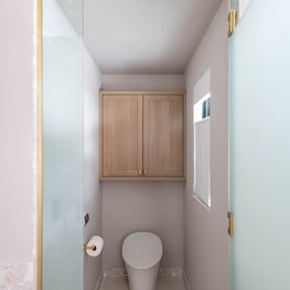 In our renovation, we extended the space five feet which allowed us to install a private water closet.