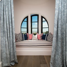 Guest Bedroom Padded Window Seat with Double Curved Dormer behind Drapes 