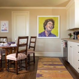 Julia Child wearing purple in this fun cottage kitchen