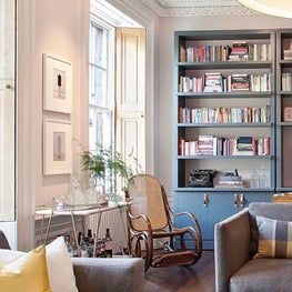 Grand Room with beautiful custom bookshelves, high ceilings and tons of light!