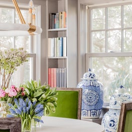 Dining Room Vignette with Built-In Bookshelves and Blue & White Ginger Jars