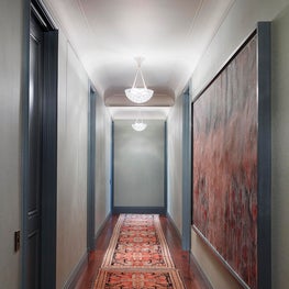 Rene Lalique pendant lights & a customized wall treatment in C & C Milano fabric