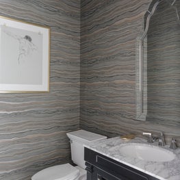 Powder Room with metallic and neutral hue wallpaper 