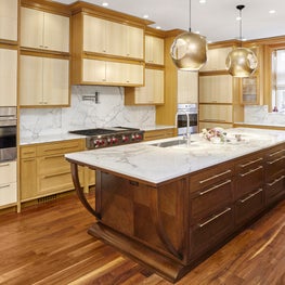Art Deco Kitchen with Oak and Birch Cabinets, Marble Countertop and Backsplash