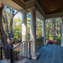 Federal Front Porch with Black Metal Railing, Tuscan Columns and Bluestone Deck