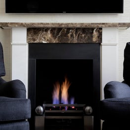 TV room with marble, textures and monotone colouring 