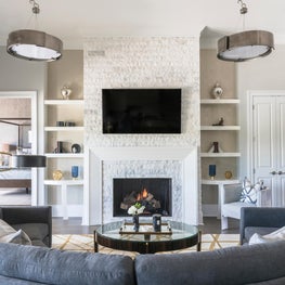 Family Room with custom stone fireplace 