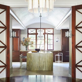 Mahogany and marble kitchen with domed tile ceiling