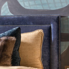 Color and texture mixture of blues and browns in velvet, wall covering, and fur
