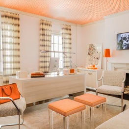 Orange and White Woman's Office with Wallpapered Ceiling