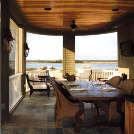 Screened Porch with Curved Wall, Stone Floor and natural Fir Ceiling Boards