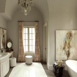 Atlanta Master Bath with vaulted ceiling, custom cabinetry, and freestanding tub