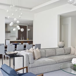 Modern family room with white light fixtures