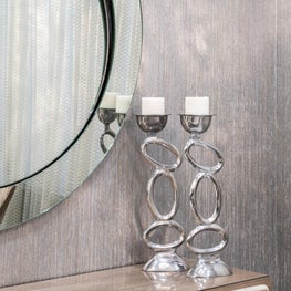 SLEEK CONTEMPORARY METALLIC RESIDENCE modern silver candle sticks, round mirror, metalic wall paper