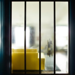 Central Park Apartment, Flow of Natural Light through Variegated Glass Walls.