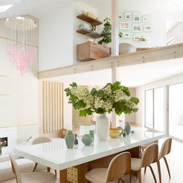 East Hampton Residence - white glass dining table with walnut & brass base