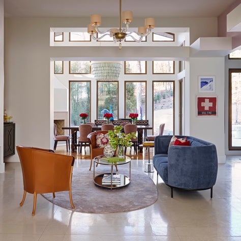 Colorful Seating Area with Custom Built-in Bars, Fireplace and Venetian Plaster Walls