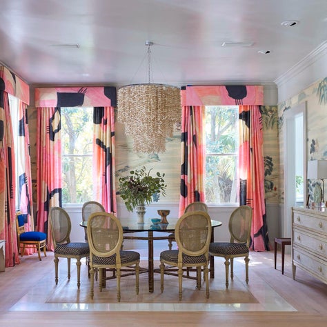 Dining room with antique wallpaper and custom painted silk drapes