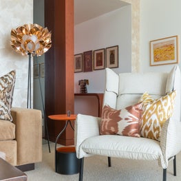 Portfolio: Indo-Asian Inspired High-Rise with warm tones and statement floor lamp 