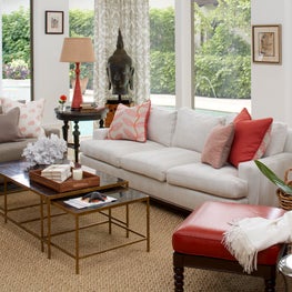 Modern neutral living room with pops of color