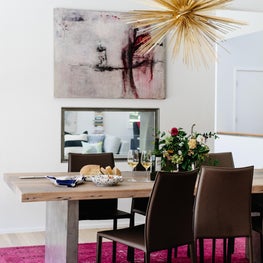 MCM Renovation, Nashville. Overdyed Rug, Modern Art, Statement Light Fixture 