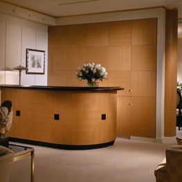 This light oak parquet custom desk lends visual interest to the space.