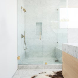 Modern Master Bath with Unlacquered Brass Living Finish
